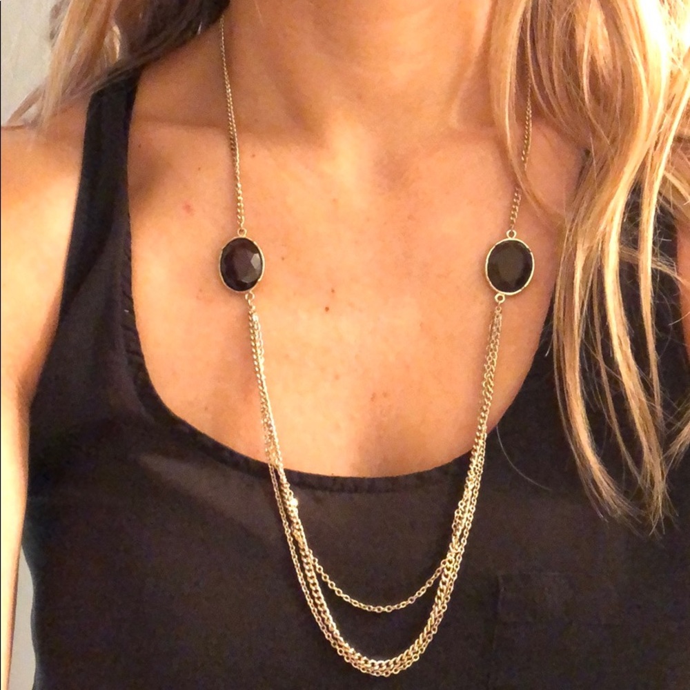 Gold necklace with black stones